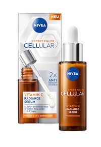 NIVEA Vitamin C Radiance Serum in a brown glass bottle with a dropper. Packaging features white and orange text on a silver background.