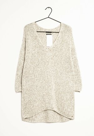 Stickad tröja - beige