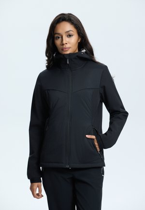 Chaqueta negra aislante con cierre de cremallera, cuello alto, bolsillos laterales y puños elásticos. Presenta un diseño elegante y minimalista, así como una textura suave.