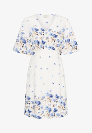 White V-neck short-sleeve dress with blue and beige floral pattern concentrated on sleeves, chest, and hem.