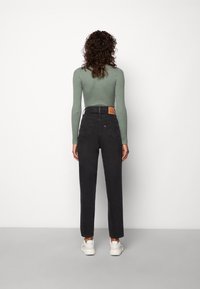 Levi's® Těhotenské džíny - destroyed denim