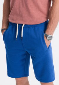 Ombre Pantaloni sportivi - blue
