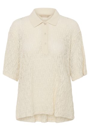 Cream-colored short-sleeve polo shirt with textured fabric and three-button placket.
