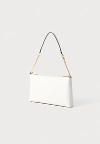 White leather handbag with a gold chain strap and a black handle. Features a rectangular shape and smooth texture with a zipper closure.