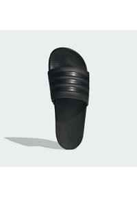 Black slide sandal made of synthetic material. Features three textured horizontal stripes on the upper band and a flat, smooth sole.