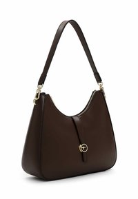 Brown leather shoulder bag with a curved shape, gold hardware accents, a top zipper closure, and a flat strap design.