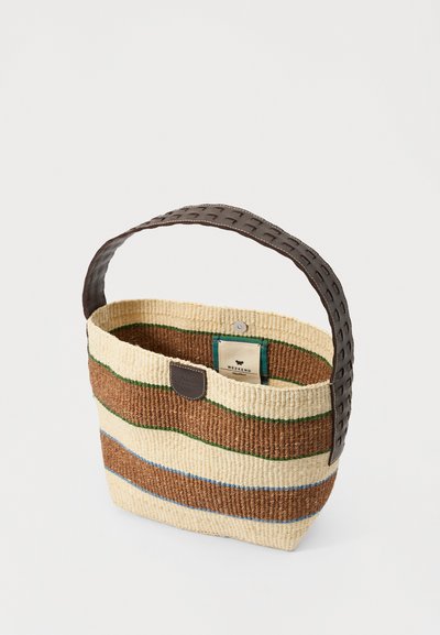 Woven tote bag with a cream, brown, and green striped pattern. Features a dark brown textured handle and a small brand label inside.