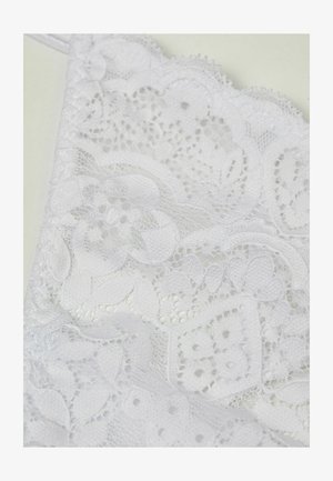 White lace fabric with intricate floral and paisley patterns. Features a textured surface, fine detailing, and scalloped edges.