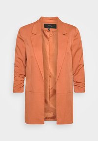 Pomarańczowa marynarka o gładkiej, miękkiej fakturze. Posiada pojedynczy guziczek z przodu, rękawy do ćwiartki oraz kołnierz z wycięciem. Wnętrze wyściełane podszewką.