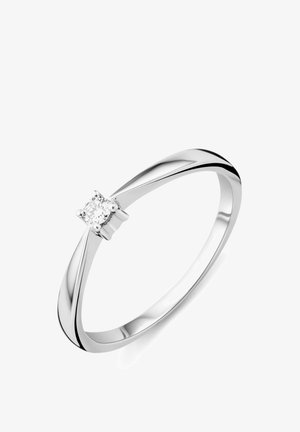 Srebrn poročni prstan z enim okroglim diamantom v štiripričvrstni nastavitvi na elegantnem, sijočem obročku.