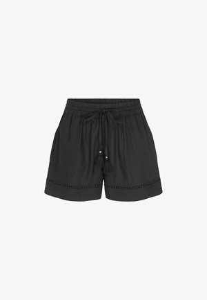 Czarne luźne szorty z elastycznym paskiem, troczkami ze sznureczkami z frędzlami oraz ozdobnym przeszyciem w pobliżu krawędzi.