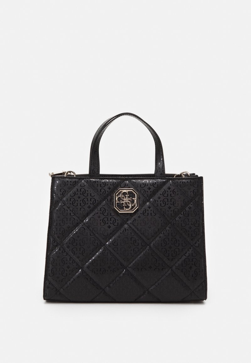 Sac à main matelassé noir avec poignées supérieures, motif de logo en relief et un emblème de marque hexagonal doré au centre avant.