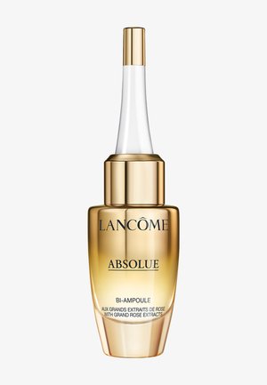 Lancôme Absolue Bi-Ampoule serum bottle with gold gradient design and dropper cap, featuring grand rose extracts for skincare.