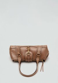 Brown leather handbag with gold hardware and dual side straps. Rounded shape with a central zipper closure and decorative front detailing.