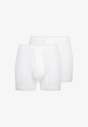 Hvide bomulds boxer briefs med frontlomme, korte ben og en bred elastisk talje med diskret branding. Blød tekstur.