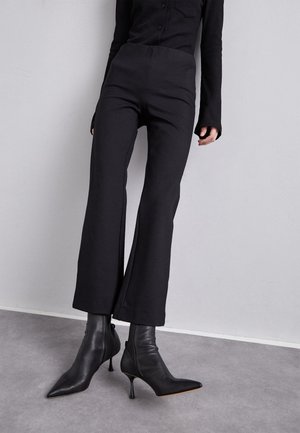 FLARED TROUSERS - Hlače - black