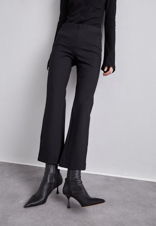 FLARED TROUSERS - Trousers