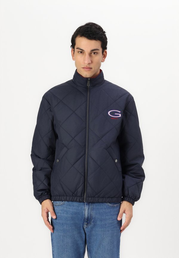 EXCLUSIVE HERITAGE 2.0 REVERSIBLE QUILTED JACKET - Übergangsjacke