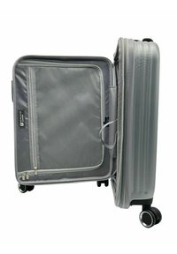 Valigia rigida grigia con superficie testurizzata, tasca interna in rete e scomparti con zip. Dotata di quattro ruote per la mobilità.