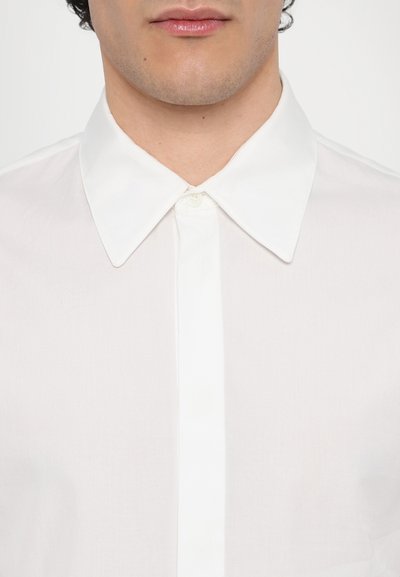 Paul & Joe COSMA - Ing - blanc