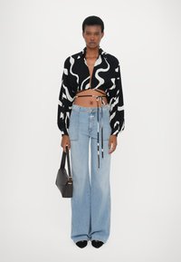 Undress Code Bluse - black