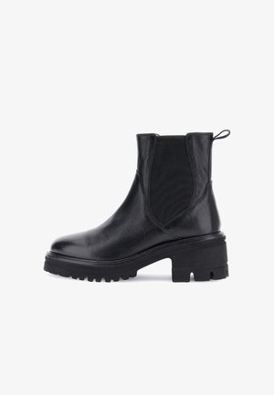 Bottines noires en cuir avec panneaux élastiques sur les côtés, surface texturée, semelle en caoutchouc épaisse et tirant à l'arrière pour un enfilage facile.