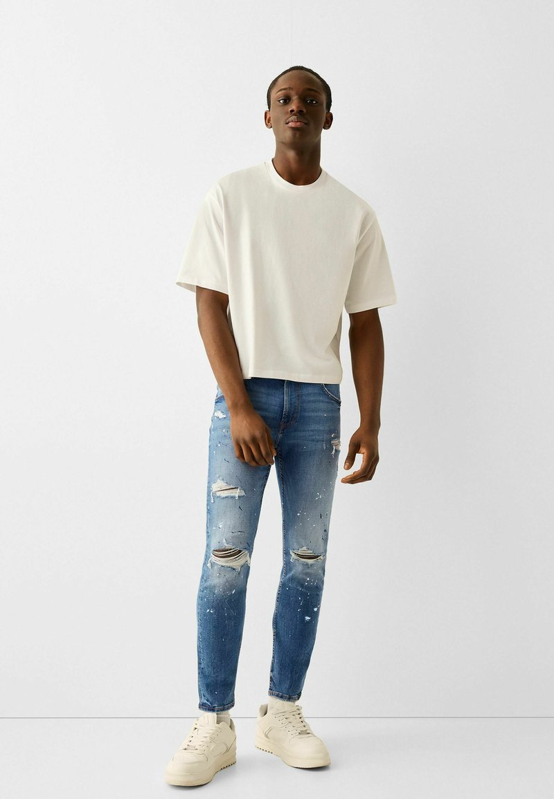 Bershka Slim fit jeans blauw denim/bluedenim Bershka Slim fit jeans blauw denim/bluedenim