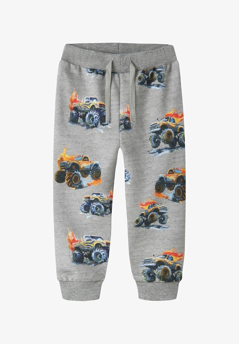 Pantaloni da tuta grigi per bambini con coulisse in vita, decorati con stampe colorate di camion mostro infuocati su tutta la superficie.