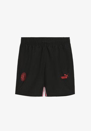 Juodi sportiniai šortai su elastine juosta. Raudonas Puma logotipas ir raudonas AC Milan emblema kairėje šlaunyje. Šoninės išpjovos su raudonais akcentais.