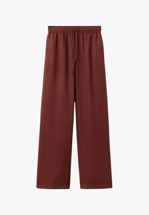 Pantalon ample marron à taille élastique avec cordon de serrage, confectionné dans un tissu léger texturé.