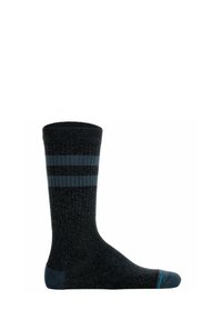 Svarta ribbade strumpor med blå ränder, tillverkade av ett texturerat material. Har en förstärkt tå och häl för hållbarhet.