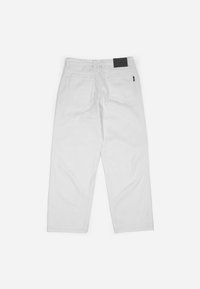 Wasted Paris CASPER PANT UNLEASHED UNISEX - Platūs džinsai - off white