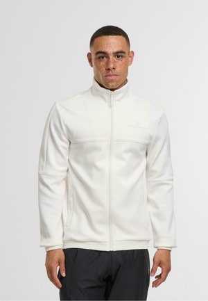 Witte fleecejas met een hoge kraag, ritssluiting aan de voorkant, twee zijvakken en textuuraccenten op de mouwen. Lichtgewicht, glad materiaal.