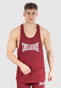Smilodox - Top