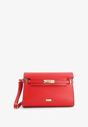 Red leather handbag with a structured shape, gold hardware, a front clasp, and a detachable shoulder strap. Smooth texture with stitching details.