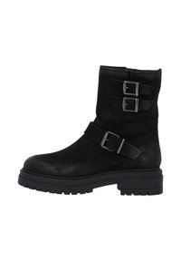 Botas de cuero negro hasta el tobillo con dos hebillas decorativas, punta redonda y una suela de goma gruesa. Textura suave con un acabado mate.