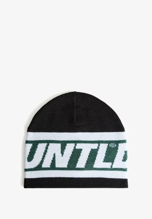 Beanie negru tricotat, cu o bandă albă cu text mare verde "UNTLD". Textură moale, formă rotundă și material elastic pentru o potrivire confortabilă.