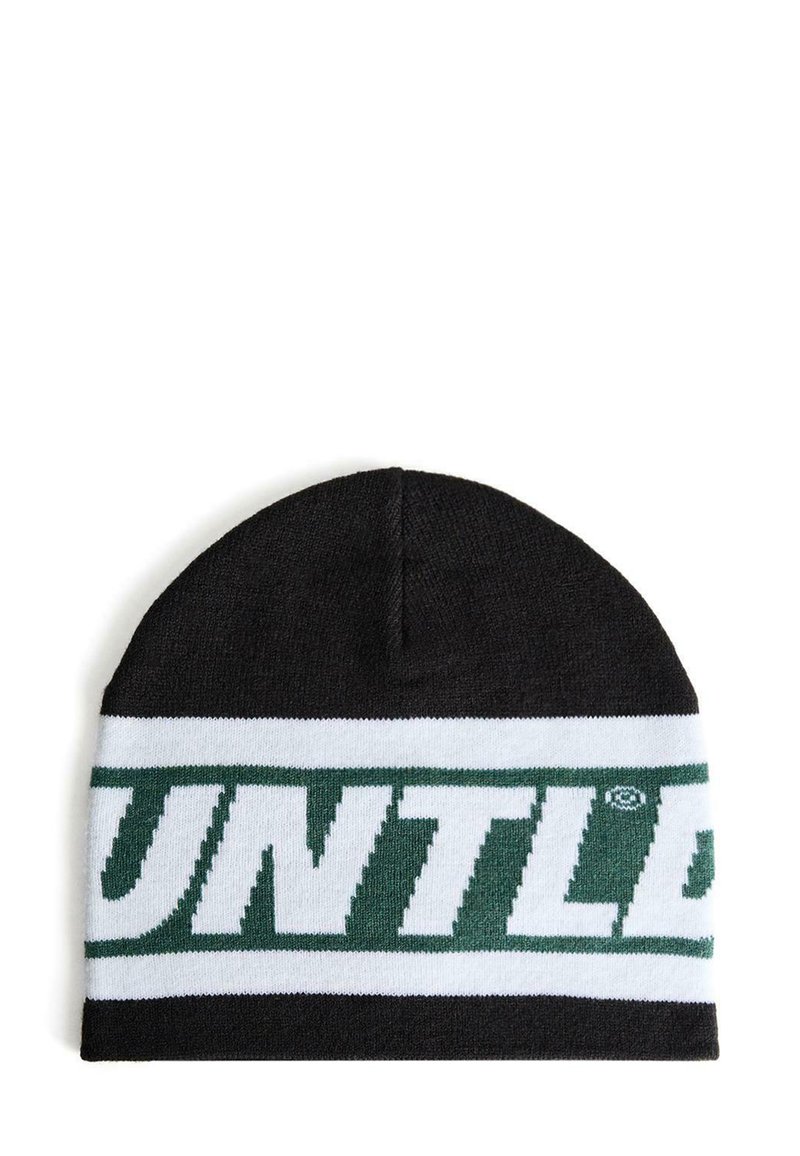 Black knit beanie featuring a white band with large green “UNTLD” text. Soft texture, rounded shape, and stretchy material for fit.