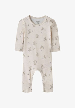 Kreminės spalvos kūdikių kombinezonas ilgomis rankovėmis, su spaudėmis palei kojas ir švelniu zuikučio bei gėlių raštu.