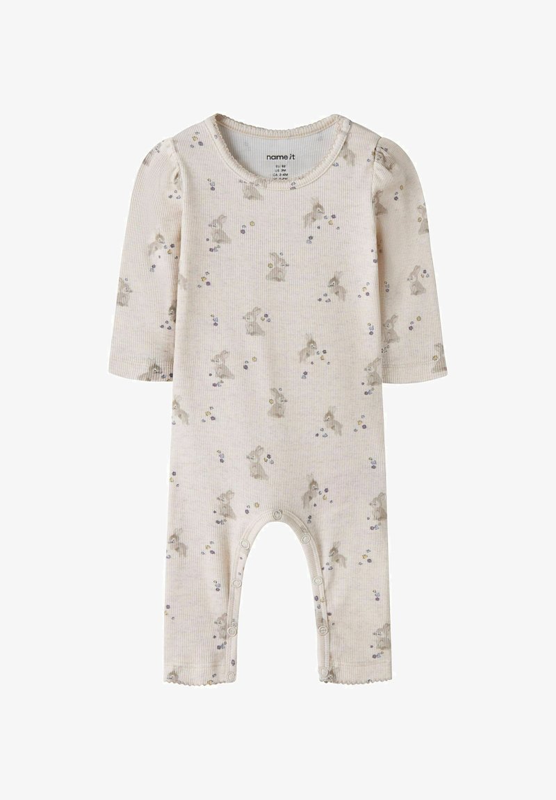 Body pour bébé couleur crème avec manches longues, boutons pression le long des jambes et un motif discret de lapin et de fleurs.