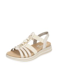 Helle beige Sandale mit Riemen-Design, weichem Fußbett und dekorativen Hardware-Akzenten; gepolsterte Sohle und elastische Knöchelriemen.