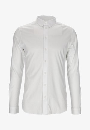 Camisa blanca de manga larga abotonada con cuello clásico. Fabricada con tela suave, presenta un corte recto y botones de perla en la parte delantera.