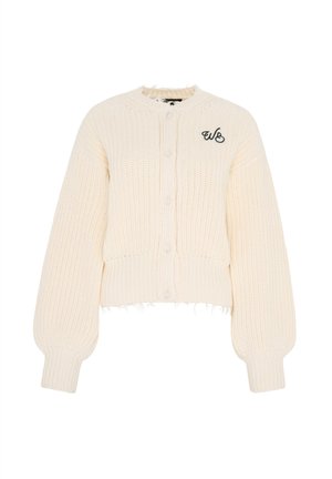 Cardigan de punto color crema con mangas largas abullonadas, cierre frontal con botones, puños y dobladillo acanalados, y pequeño logo negro "wb" en el pecho.