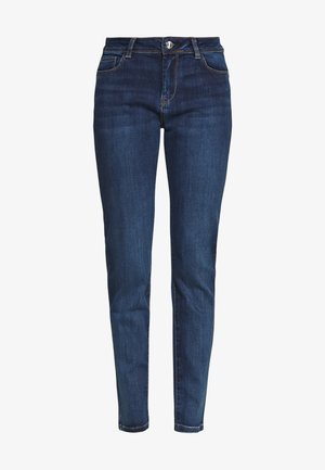 Dark blue denim jeans with a slim fit, featuring a standard waistband, front pockets, and contrasting stitching details.