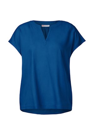 Sininen lyhythihainen paita, jossa on V-pääntie. Sileä, kevyt kangas, hieman levenevä muoto ja pyöristetty helma. Ei näkyviä kuvioita tai koristeita.