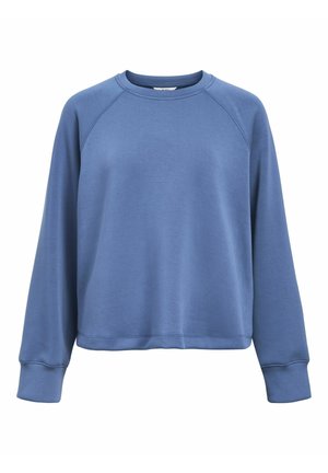 Blå sweatshirt med rund hals, raglanærmer og ribbede manchetter. Stoffet ser blødt og let ud med en glat tekstur.