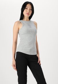 Marc O'Polo DENIM TROUSERS MID WAIST FLARED - Platėjantys džinsai - black