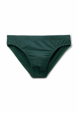 Bañador tipo slip para hombre de color verde oscuro con cinturilla elástica y logo sutil en el lado derecho, extendido sobre un fondo blanco.