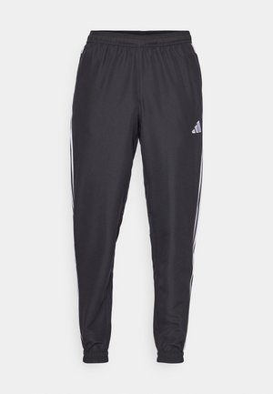 adidas Performance TIRO 25 ESSENTIALS WOVEN - Tracksuit bottoms - black/white