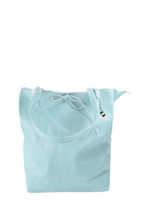 Light blue leather shoulder bag with two straps and a small pendant featuring the Italian flag hanging from one strap.